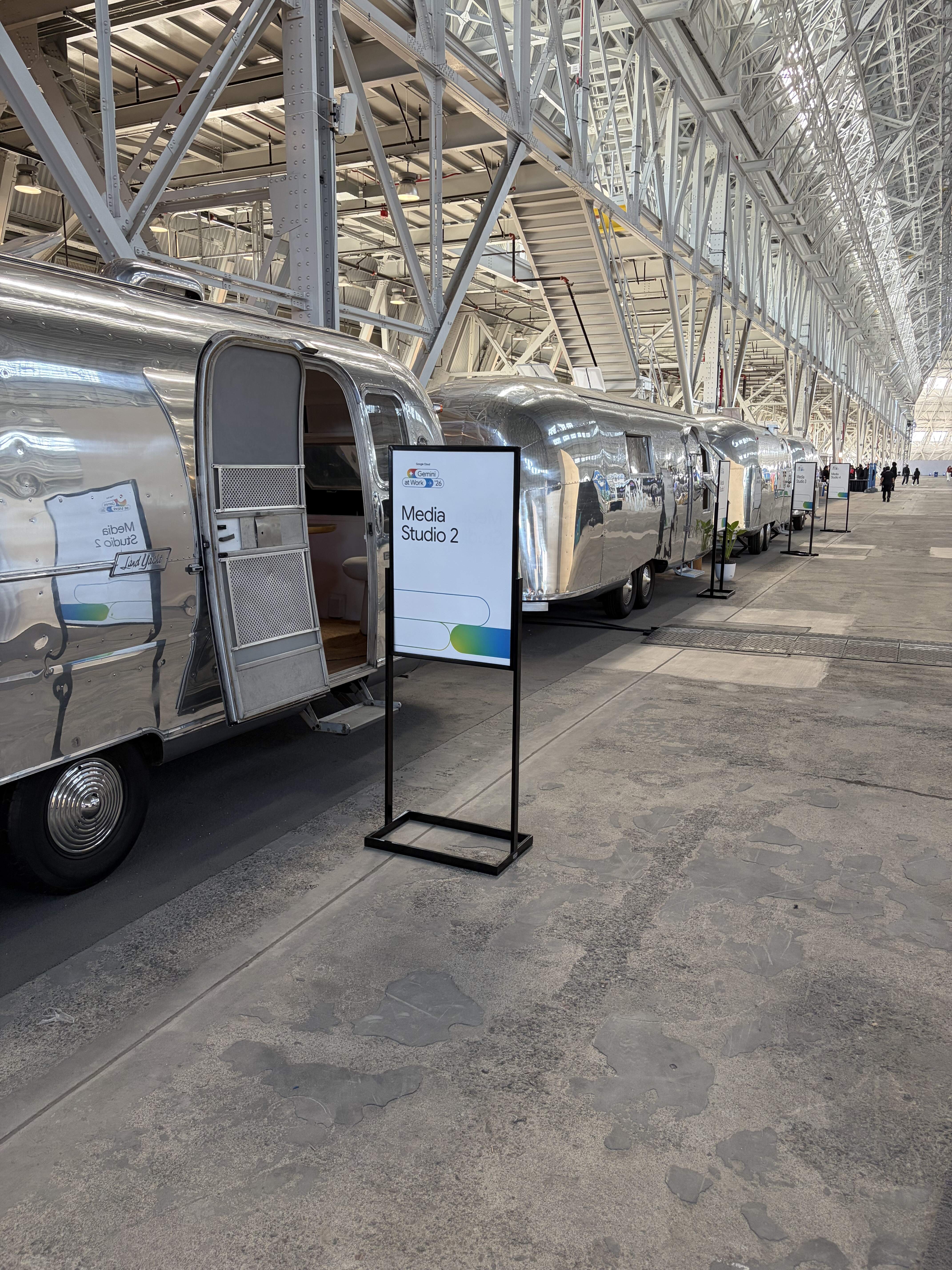 Vintage Airstreams used as media studios inside a conference venue