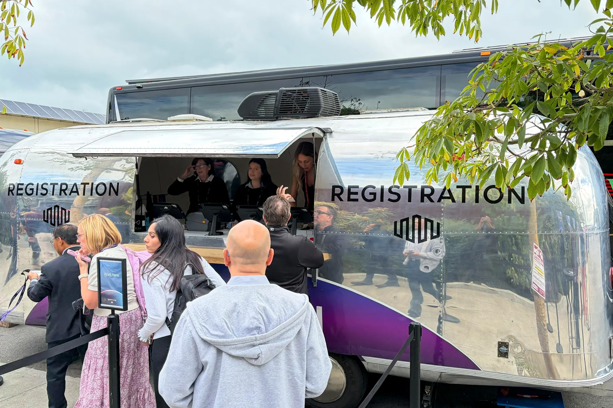 Vintage Airstreams used as media studios inside a conference venue