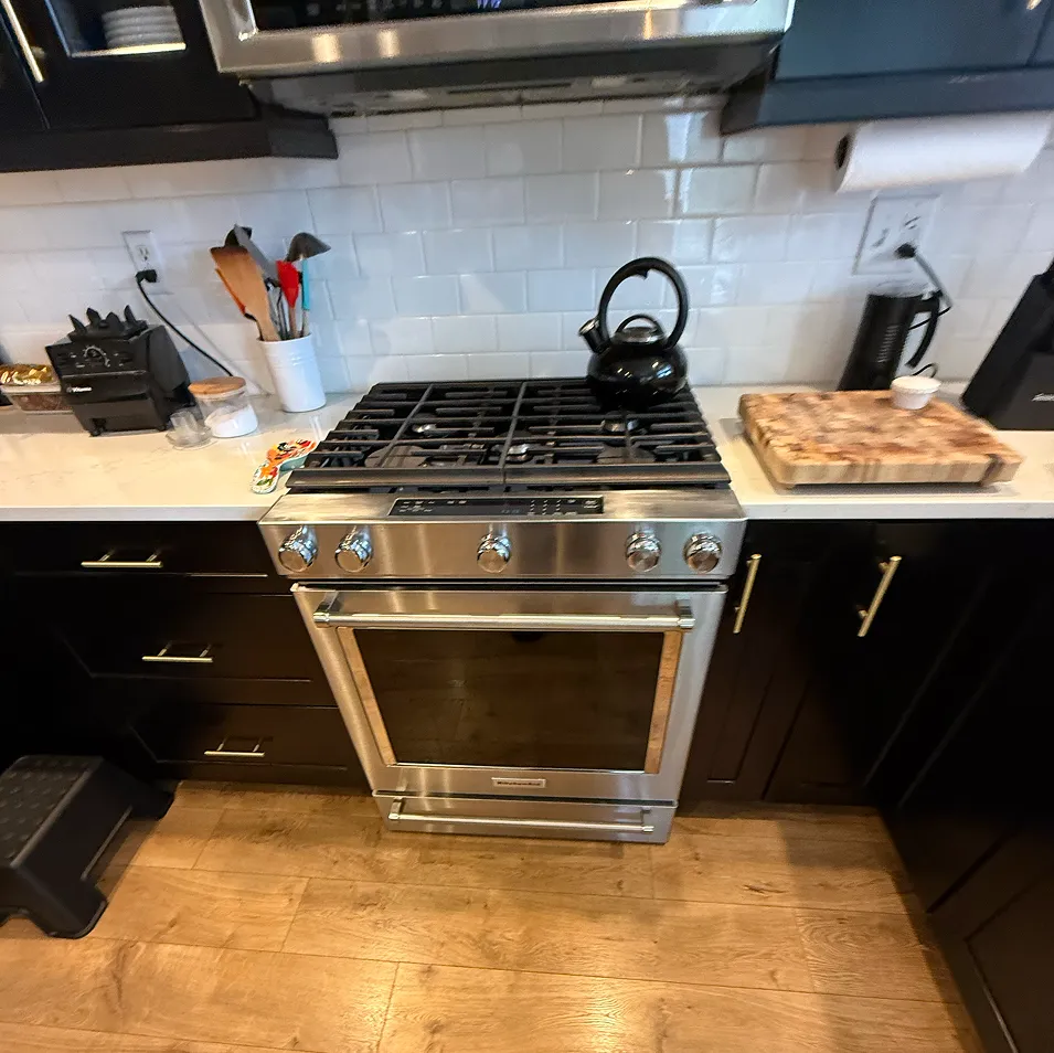 KitchenAid gas range with oven in a residential kitchen