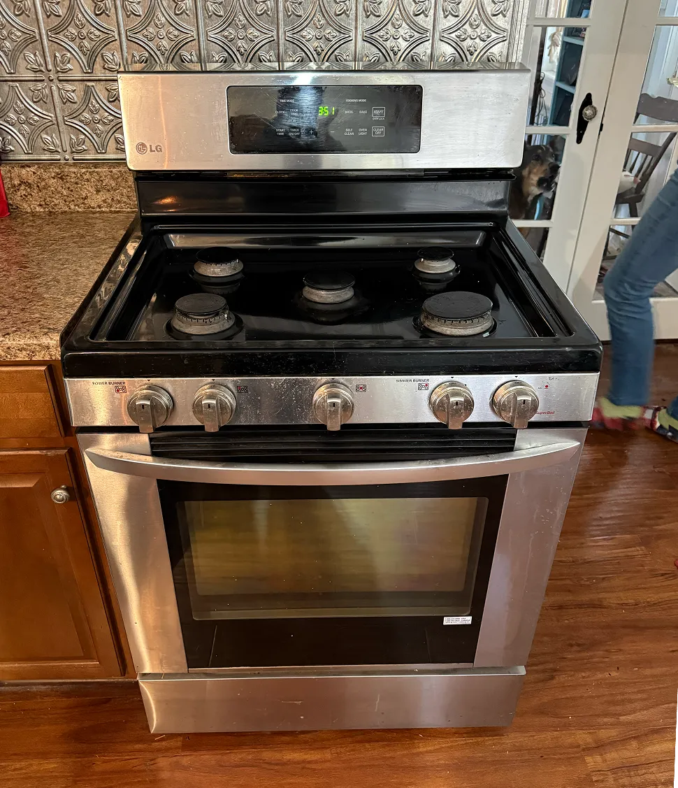 LG gas range with 5 burners being serviced in a Bridgewater NJ home
