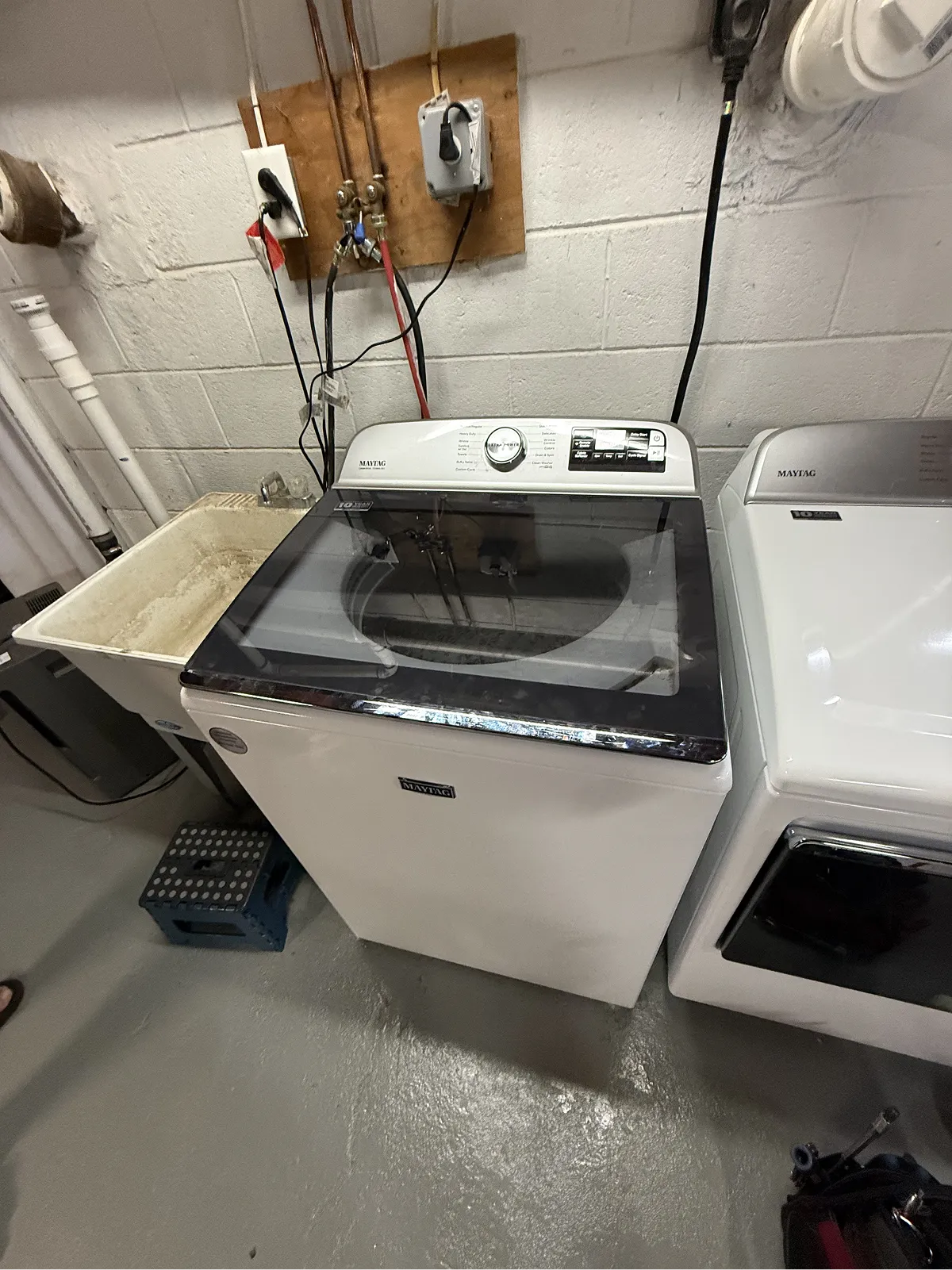 Maytag top-load washer being serviced in a NJ home laundry room
