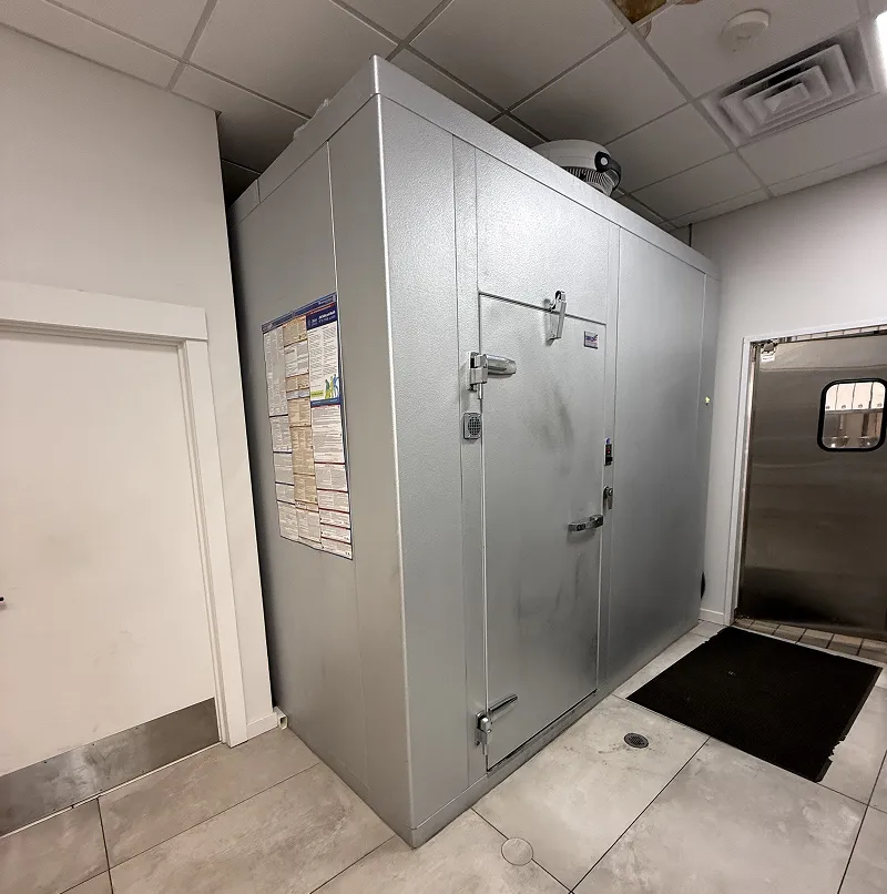 Commercial walk-in freezer with insulated panels and heavy-duty door in a Bridgewater NJ restaurant