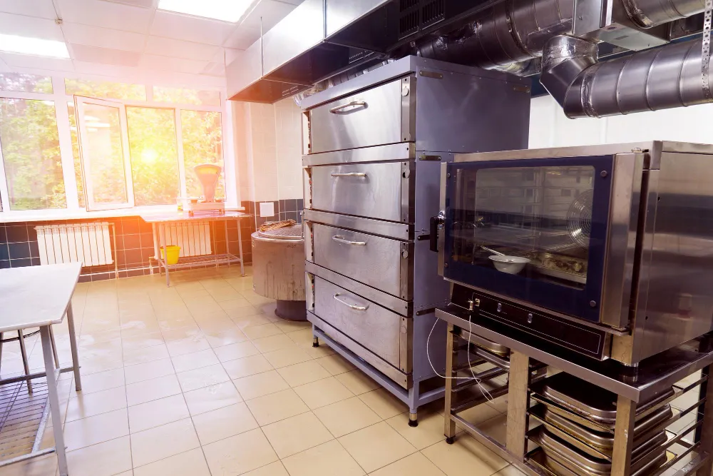 Commercial deck oven and convection oven in a restaurant kitchenCommercial deck oven and convection oven in a restaurant kitchen