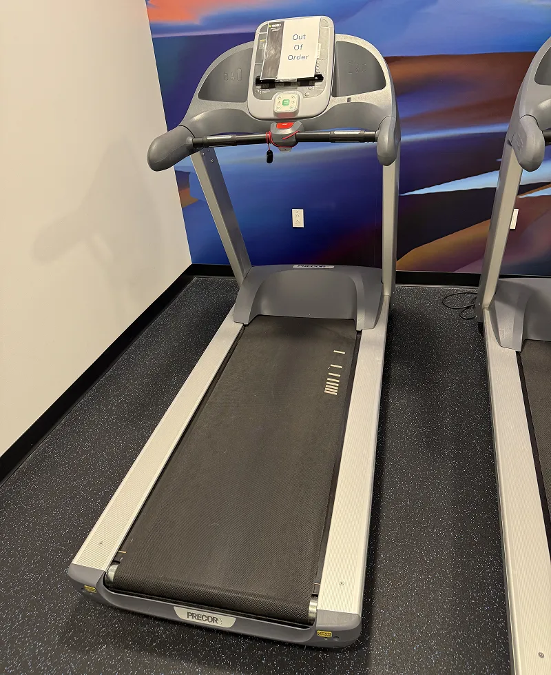 Precor commercial treadmill marked out of order awaiting repair at a NJ gym facility