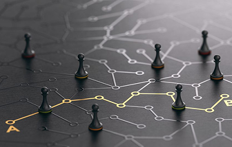 Black pawns positioned along interconnected white and yellow network lines on a dark surface, symbolizing data or strategy connections.