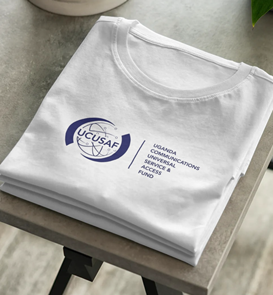 White folded t-shirt with a blue logo and text reading Uganda Communications Universal Service & Access Fund.