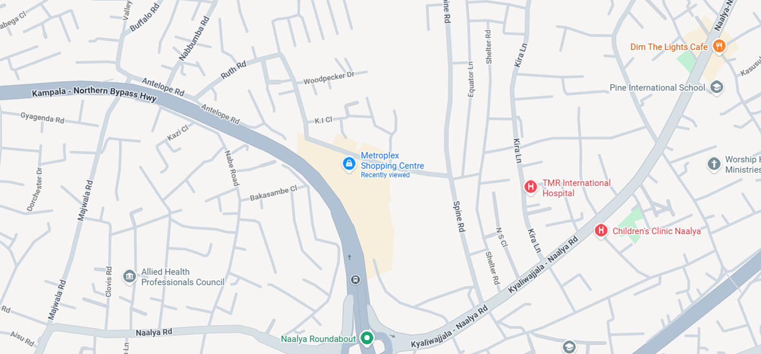 Map showing Grindstone Ltd's location on the Kampala Northern Bypass Highway intersecting with Naalya Road at Naalya Roundabout, highlighting Metroplex Shopping Centre