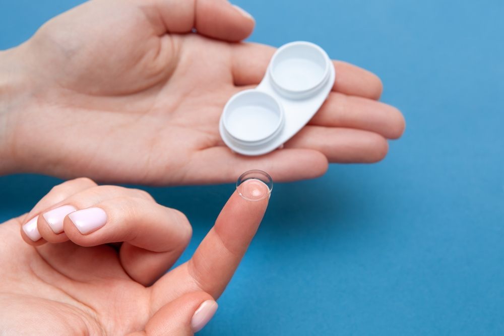 How Do Contact Lenses Improve Peripheral Vision Quality? Eye lenses. In beautiful female hands there is a case and soft contact lenses. Contact lenses for eyes. Close-up.