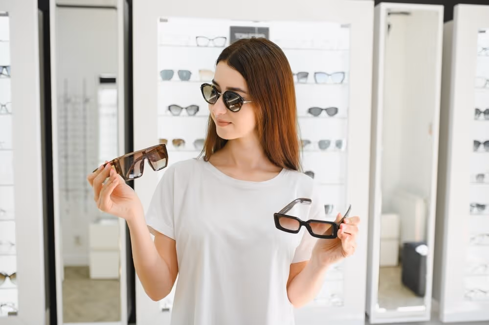 Woman Trying on Sunglasses