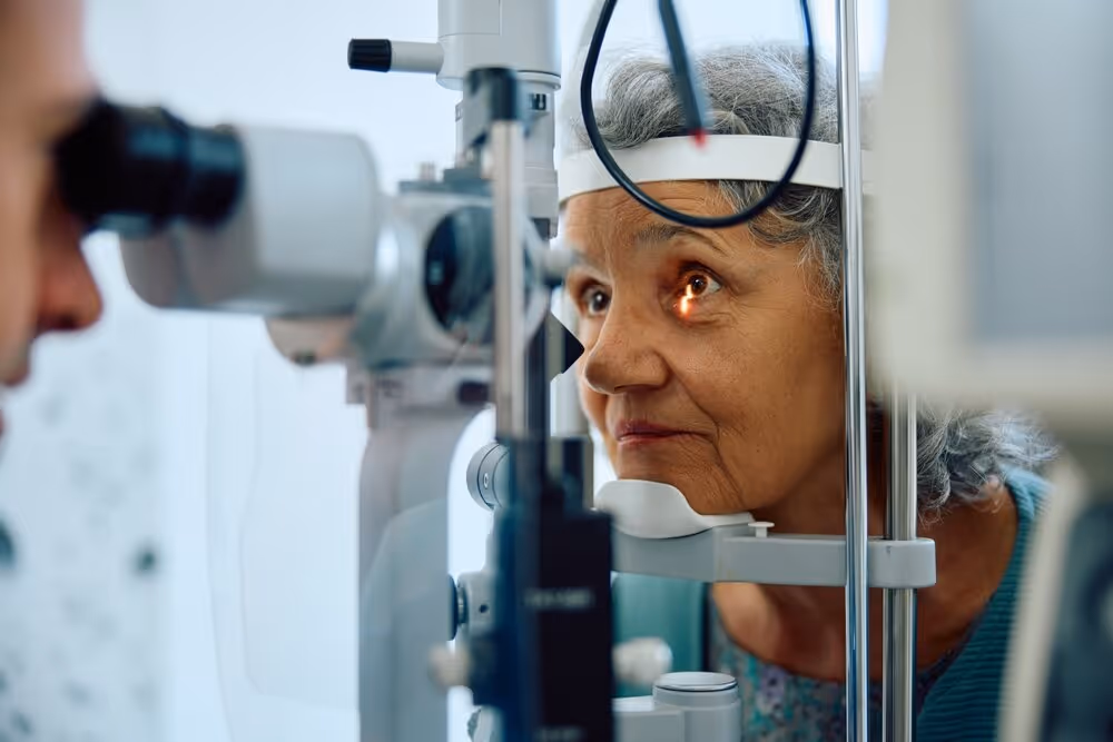 Eye Exams. Elderly lady having eye exam.
