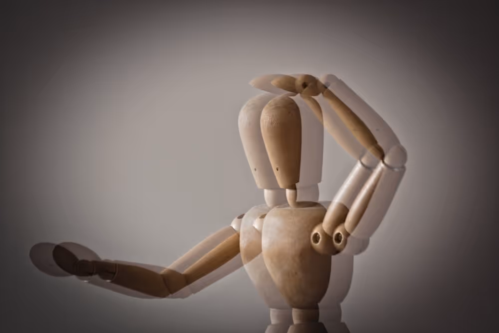 Astigmatism. Blurry image of doll.