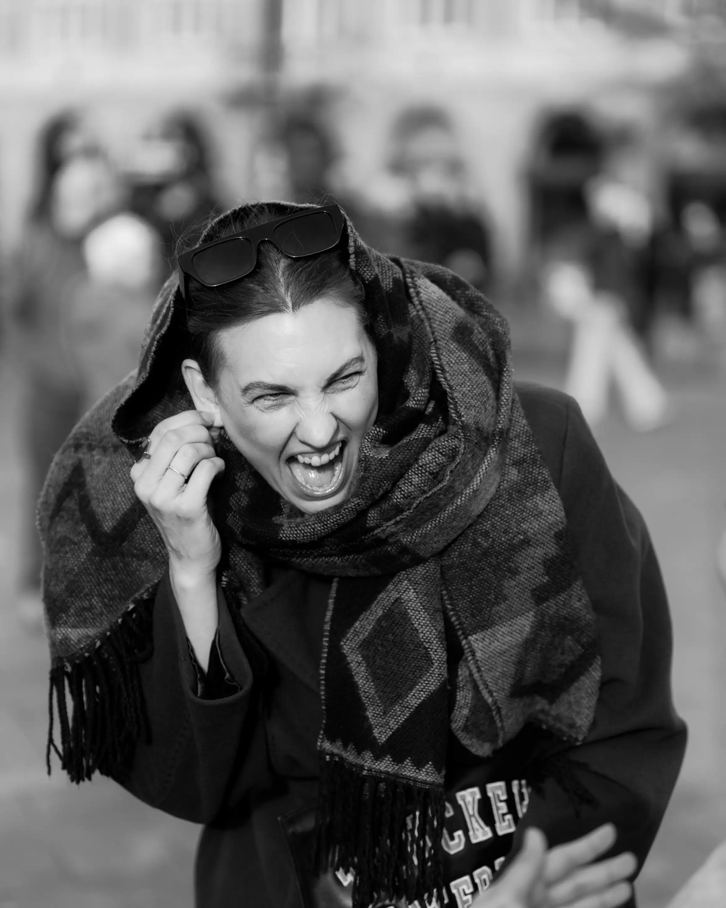 An excited person laughing