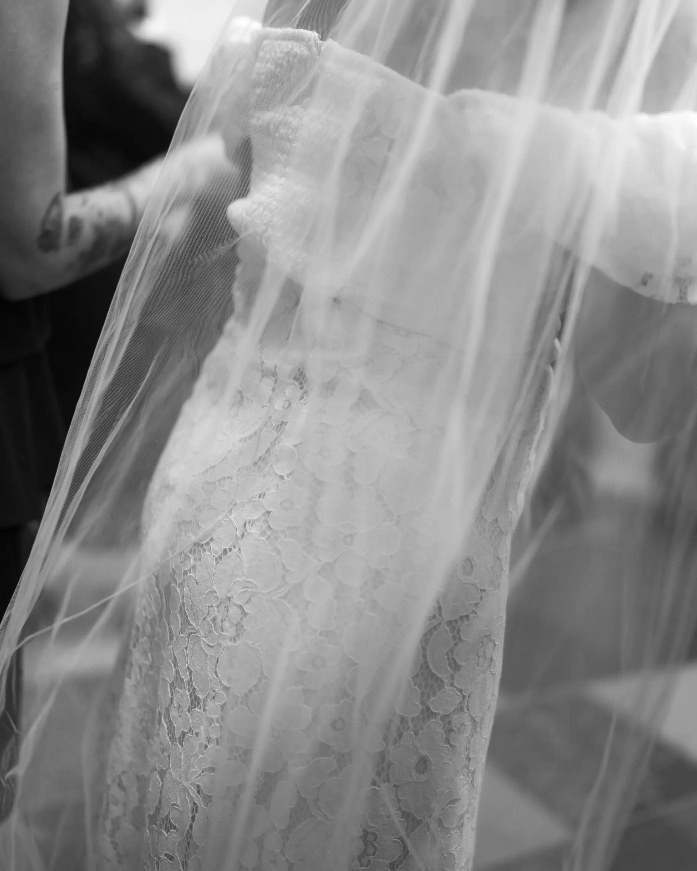 Detail of a bride's veil in black and white