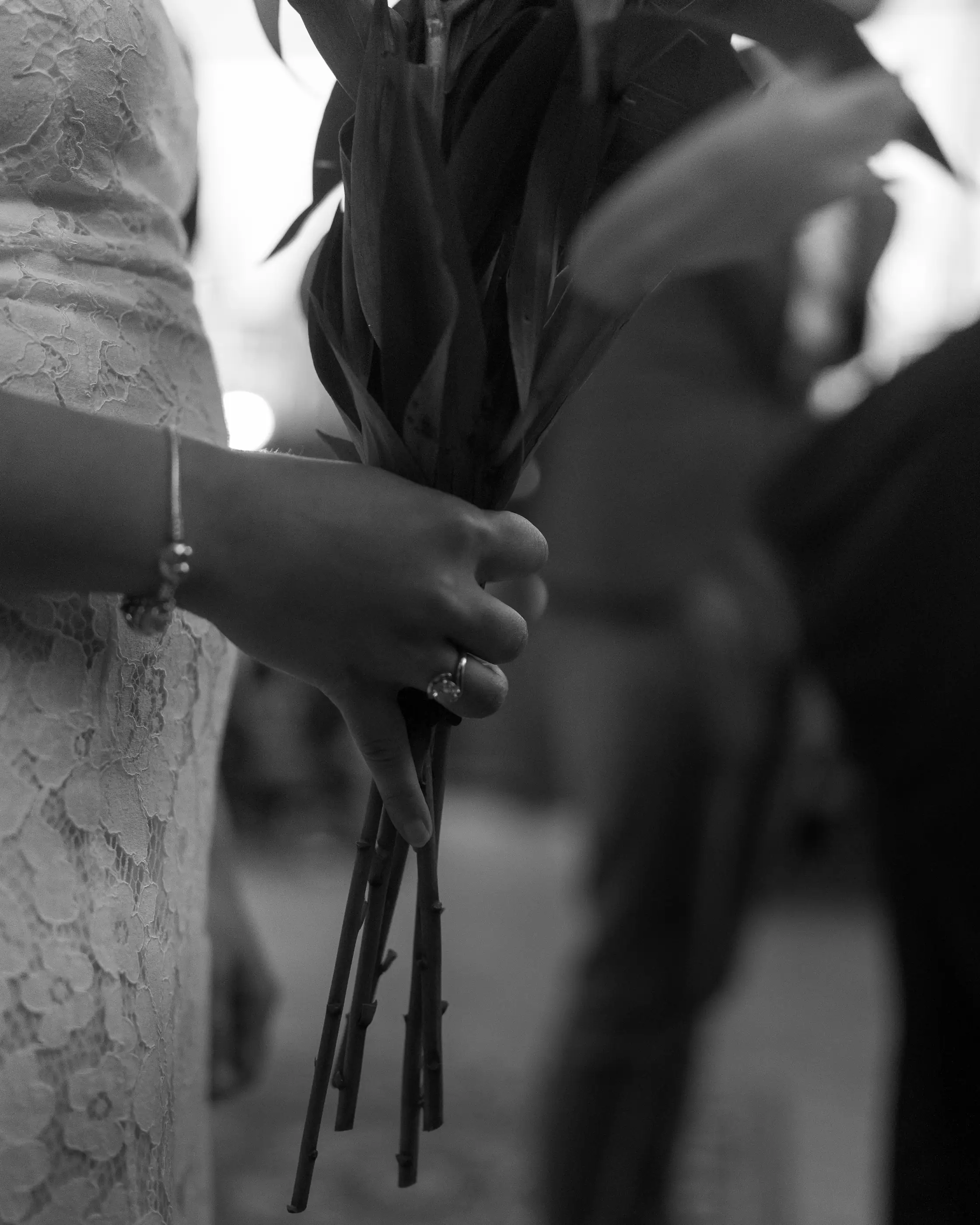 A bride holding a floral boquet