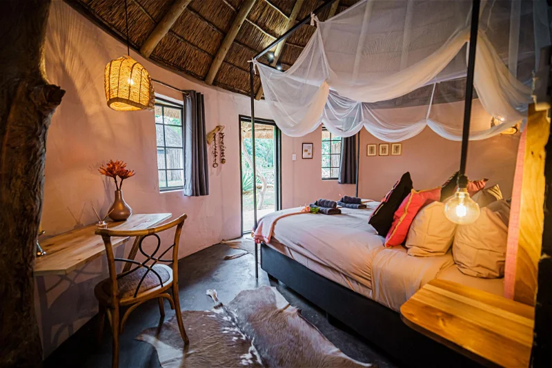 Double Rondavel with a king bed, en-suite bathroom, aircon, and private terrace. Twin option available on request.