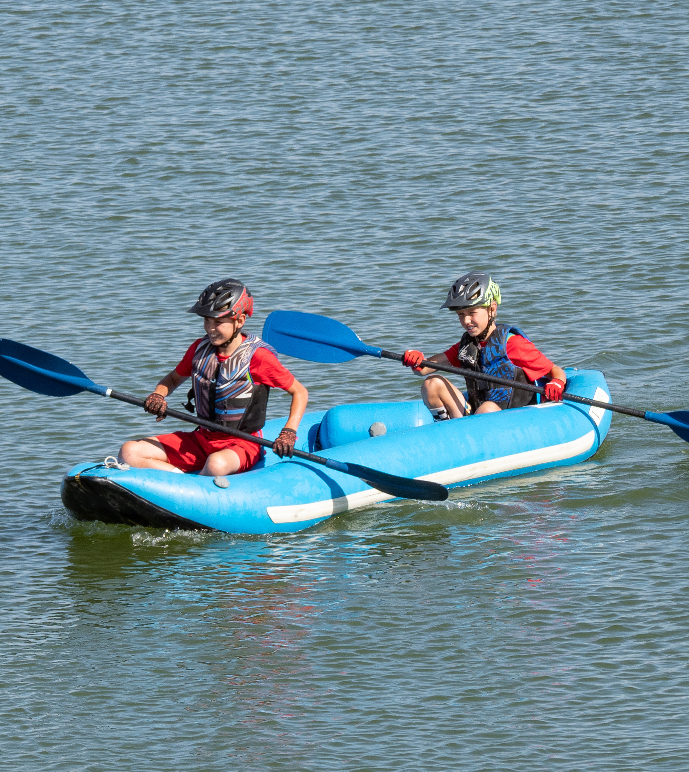 Young athletes racing through red rock desert terrain at Highline State Park Fruita during The Kids Adventure Race 2026