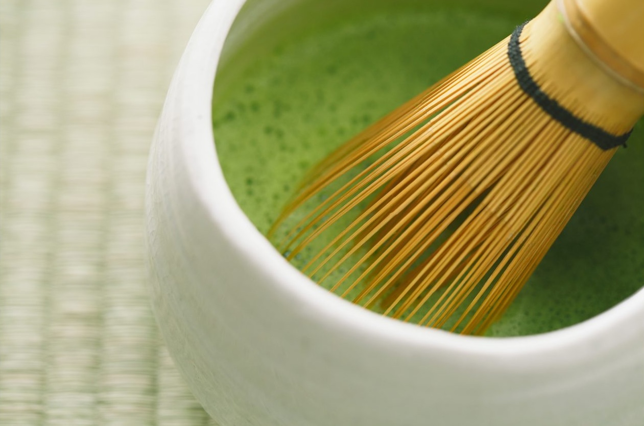 A freshly whisked bowl of vivid green matcha