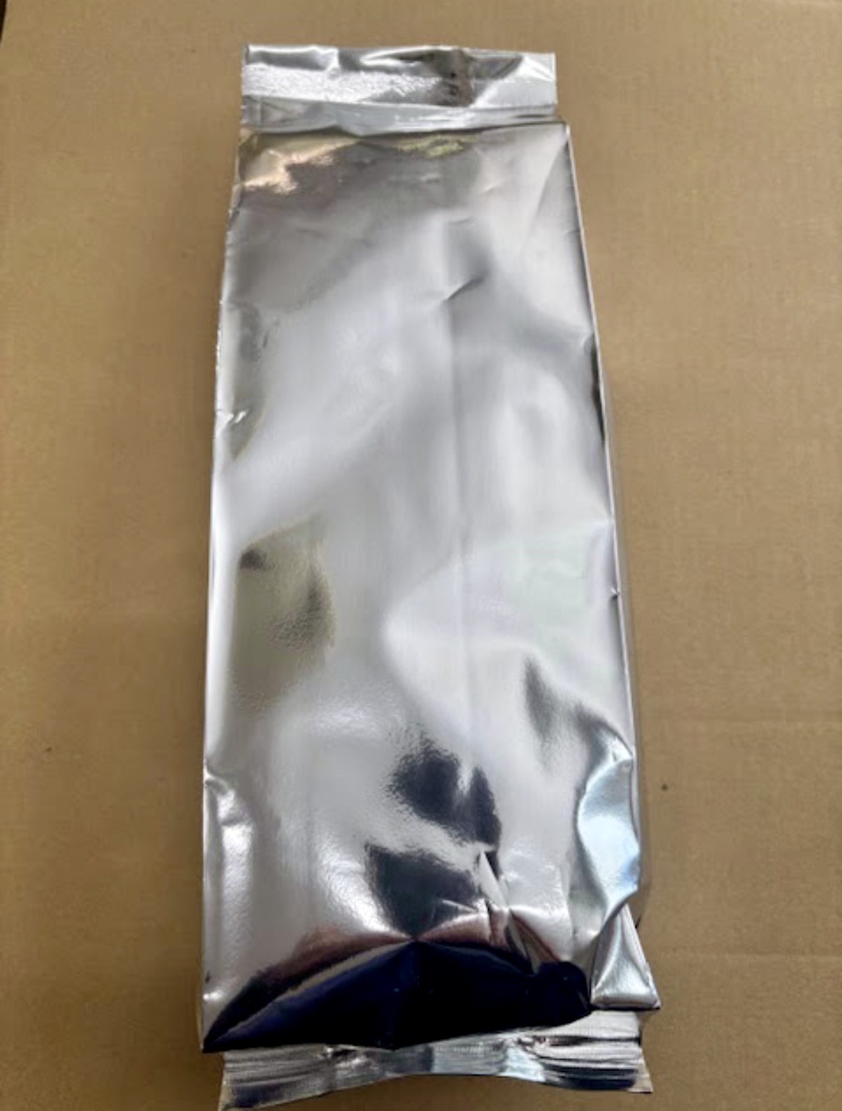Sealed foil bag of bulk matcha, the light-proof packaging used for wholesale shipments.