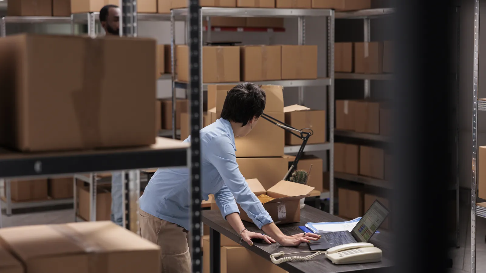 Shipping paperwork checked in a warehouse, for the guide to matcha and the US forced-labor tariff