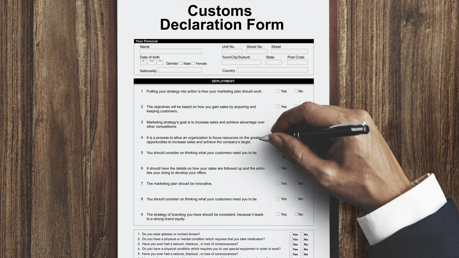 A customs declaration form being filled in by hand