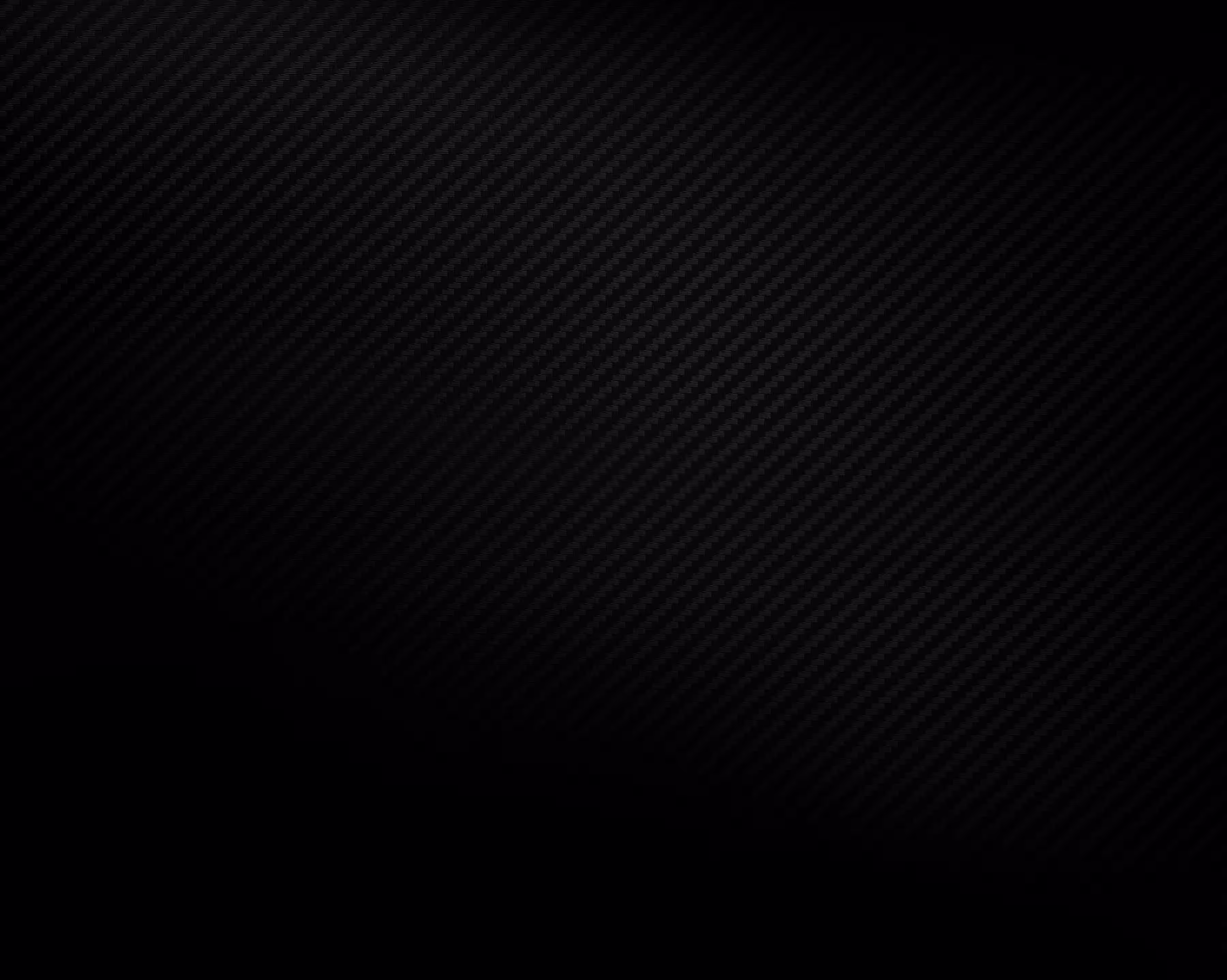 Black carbon fiber texture with a subtle diagonal weave pattern and gradient shading.