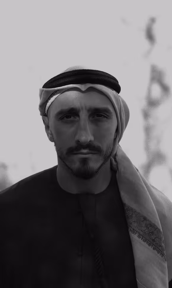 Portrait of an Arab man in traditional white thobe and keffiyeh