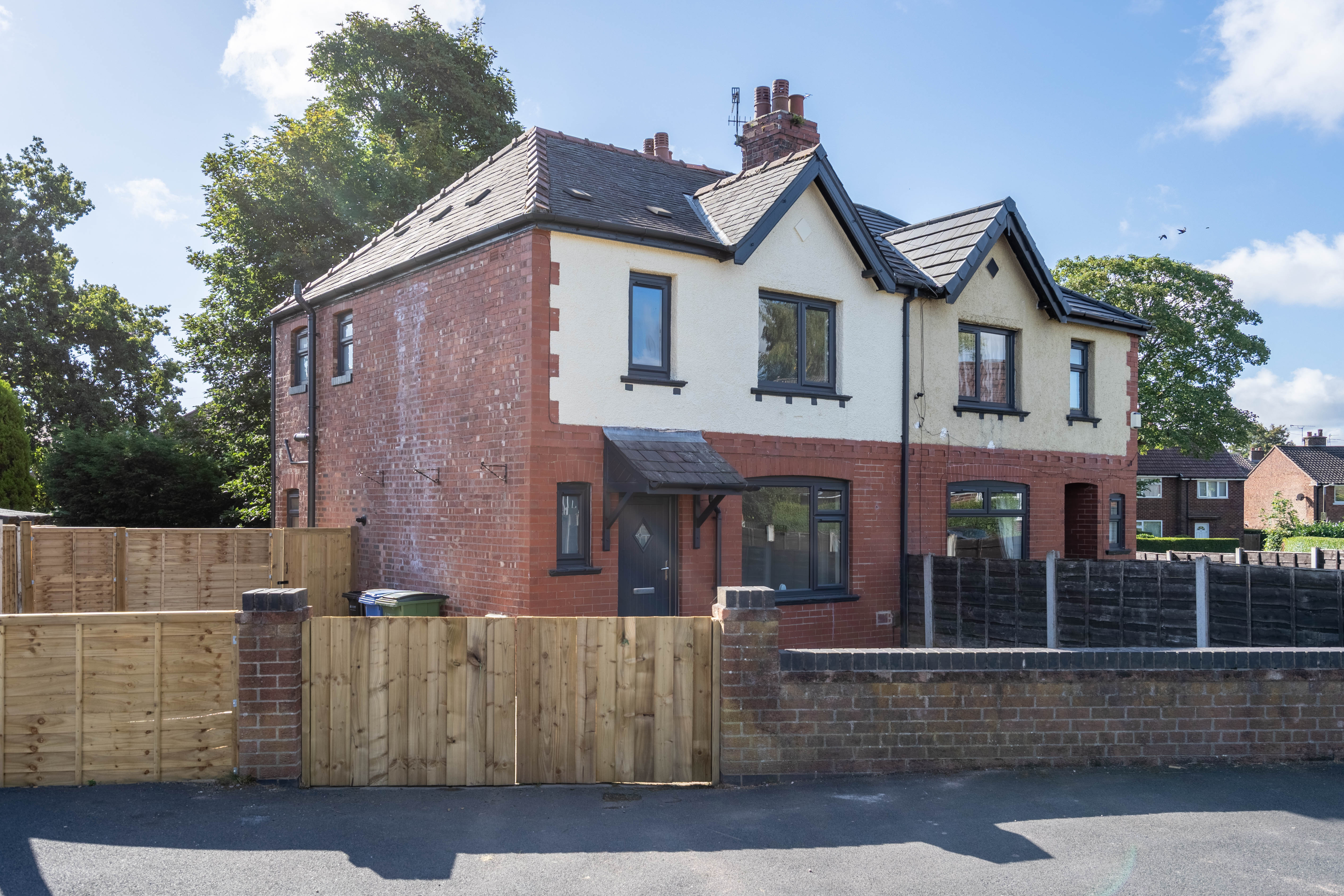 Rental property exterior maintenance with fencing and brickwork repairs in Derbyshire