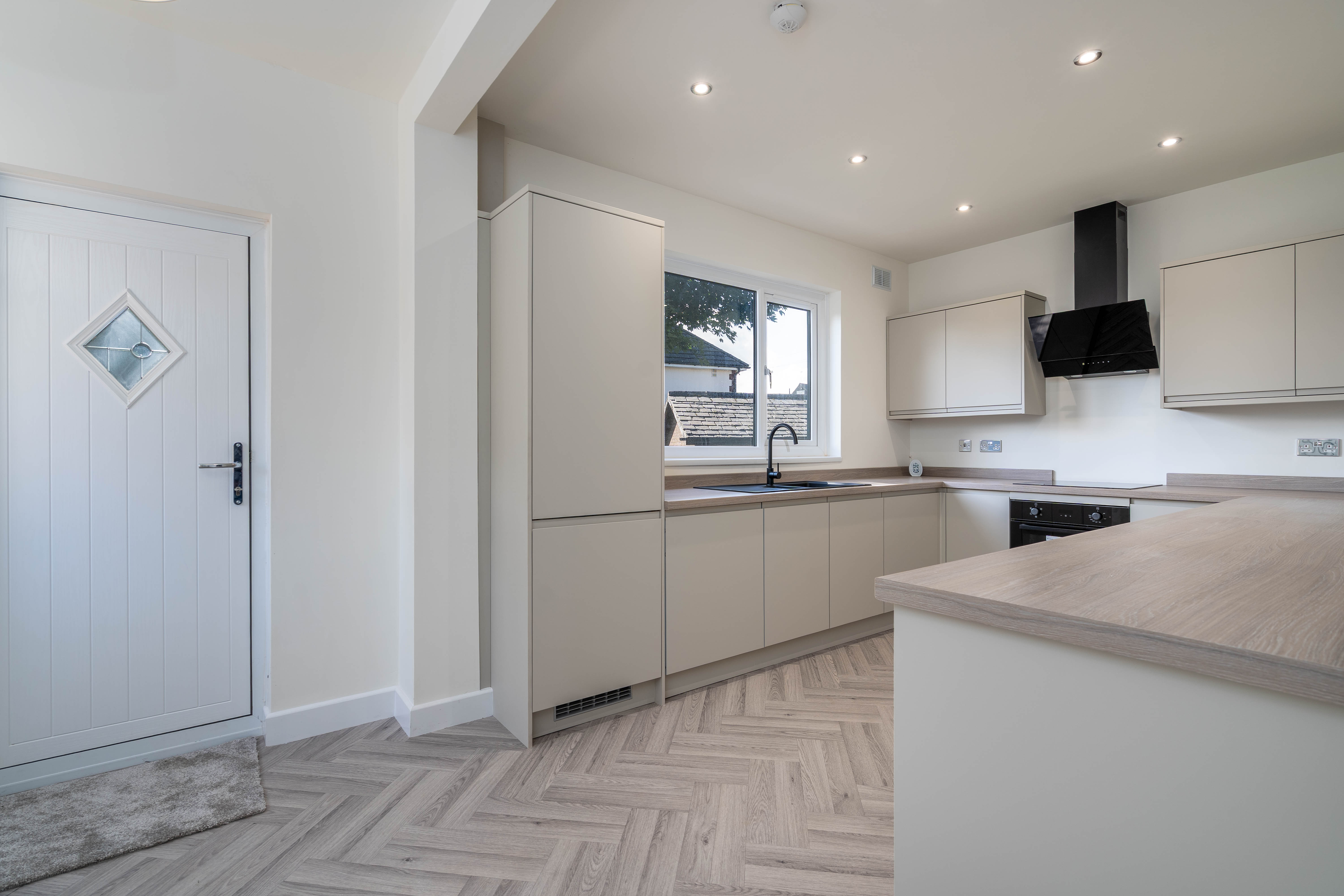 Kitchen installation with fitted units and appliances in Manchester home