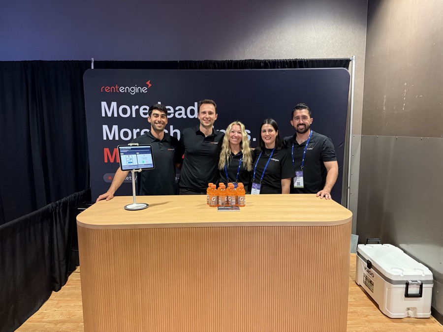 The RentEngine team at a conference booth