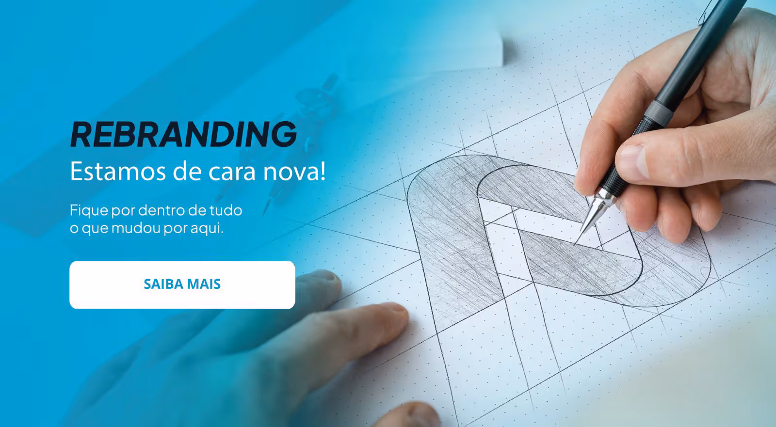 Hand sketching a detailed geometric logo design on dotted grid paper with a black pen.