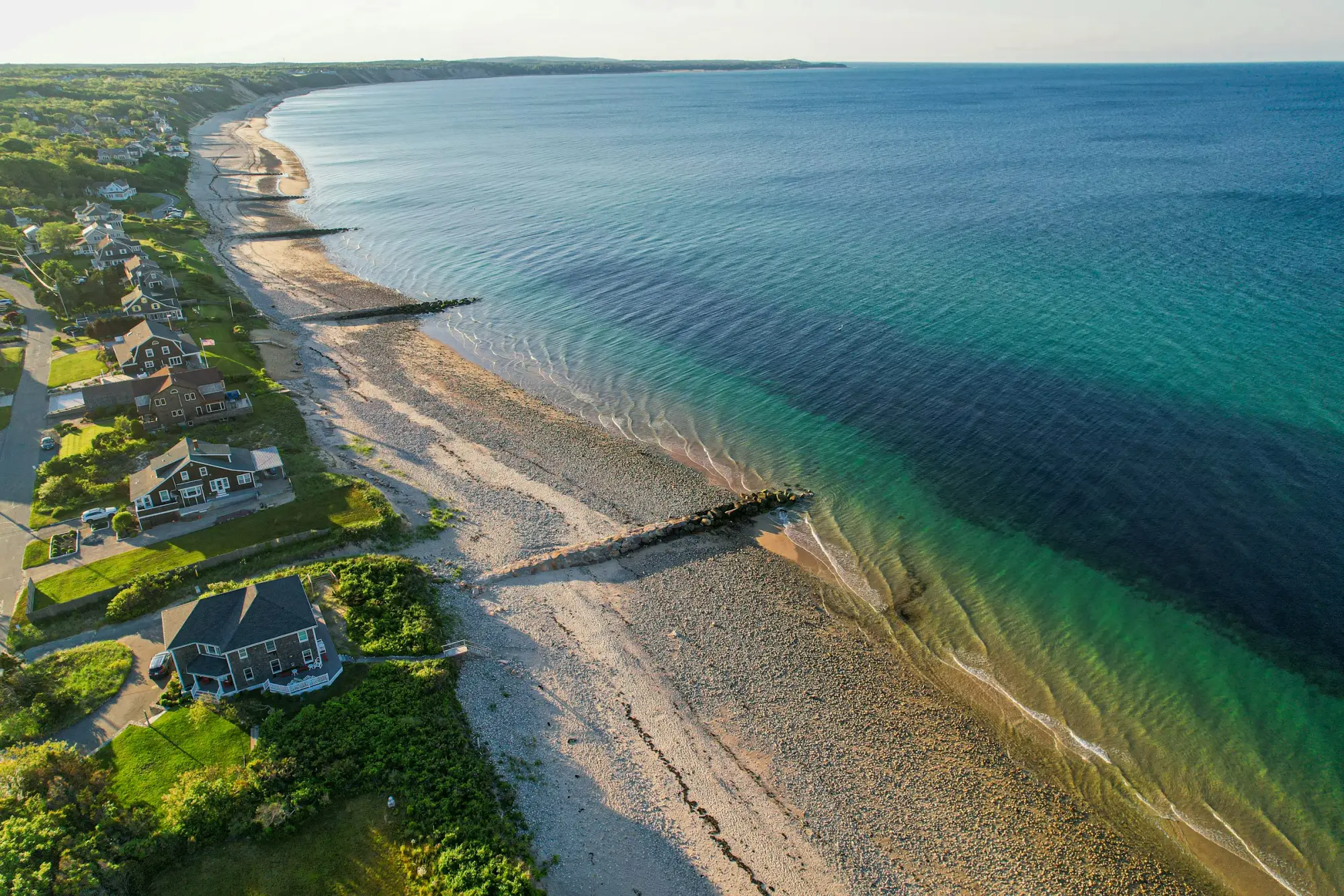 Drone view of houses along a Cape Cod beach