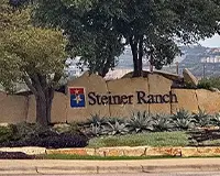Steiner Ranch, TX master-planned community with manicured residential lawns.