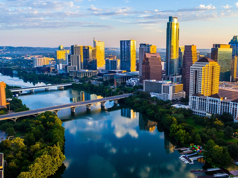 Austin, TX residential neighborhood with lush green lawns.