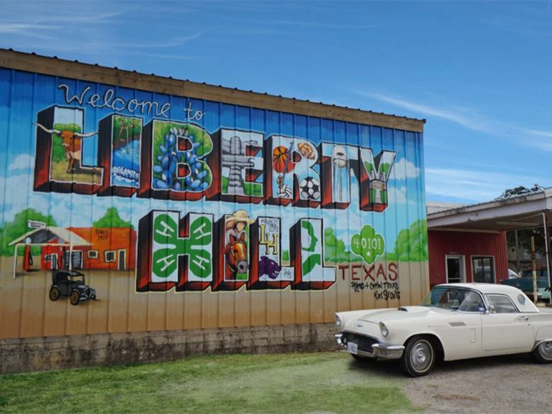 Liberty Hill, TX rural and residential neighborhoods with well-kept lawns.