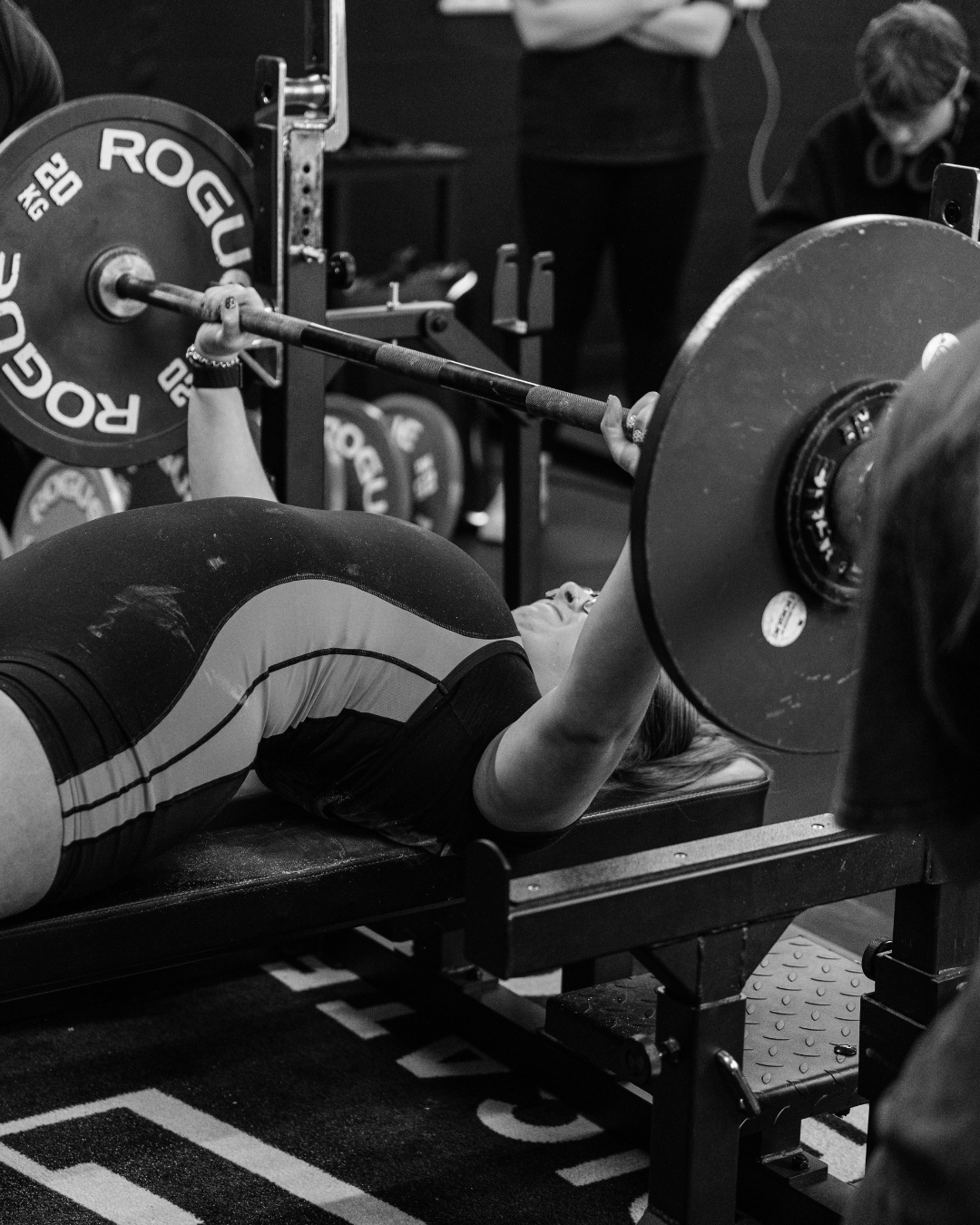 Powerlifting competing at a powerlifting competition