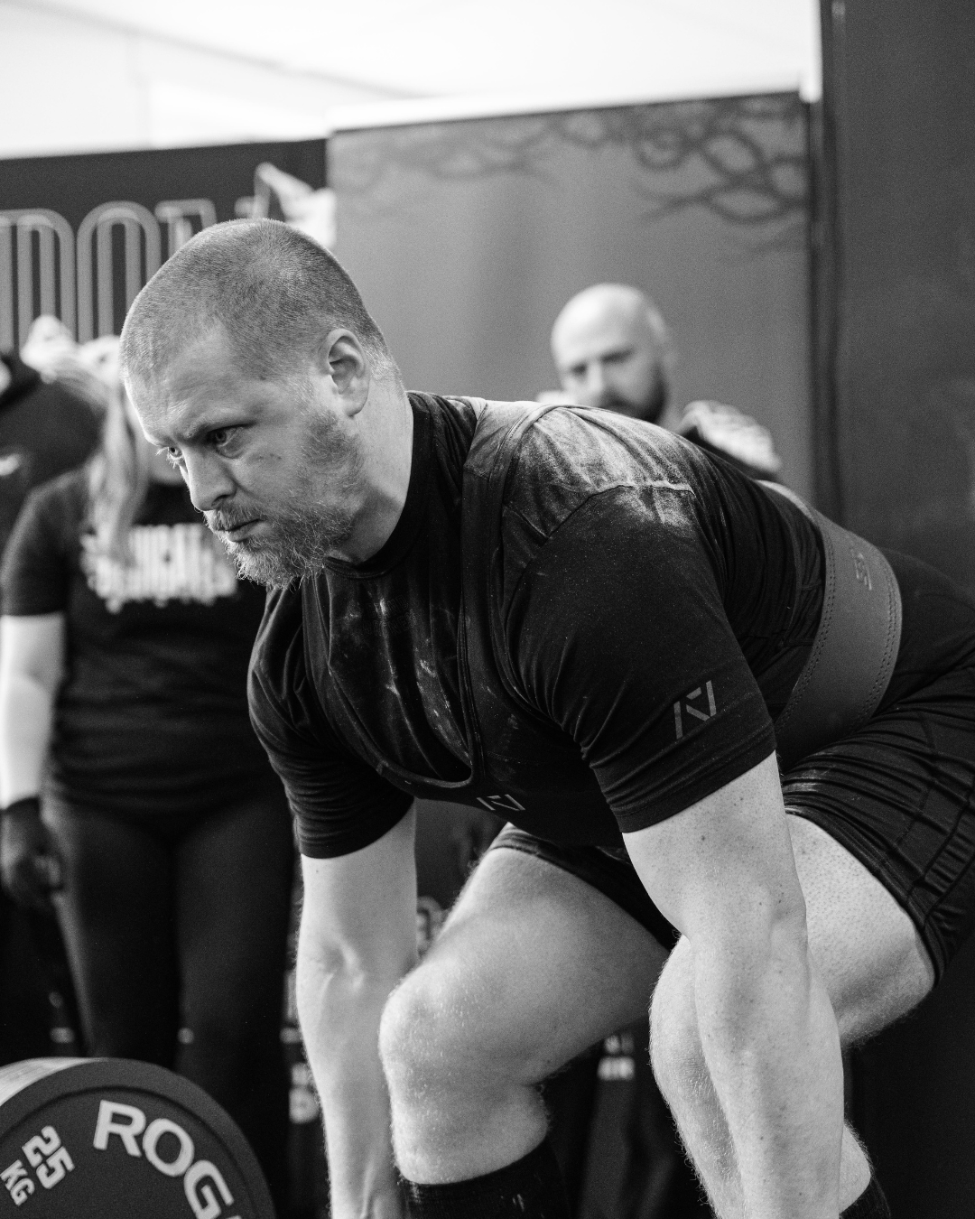 Powerlifting competing at a powerlifting competition