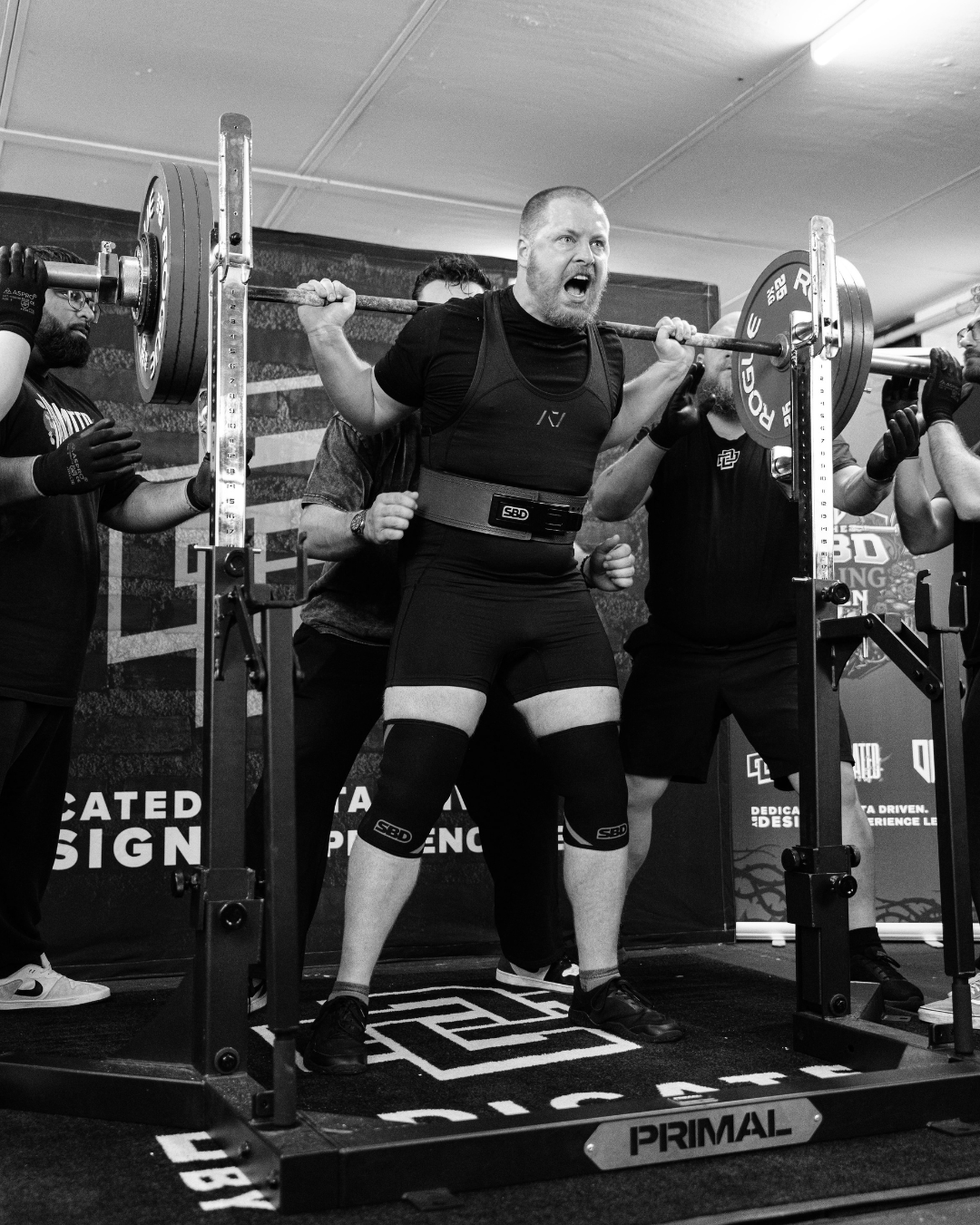 Powerlifting competing at a powerlifting competition