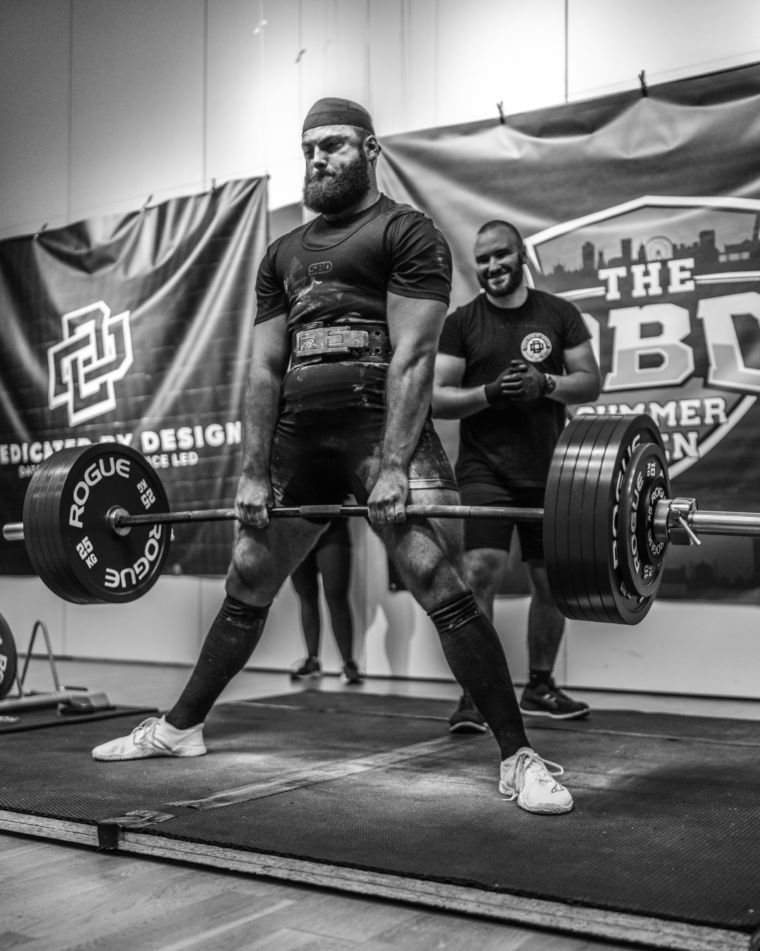Powerlifting competing at a powerlifting competition