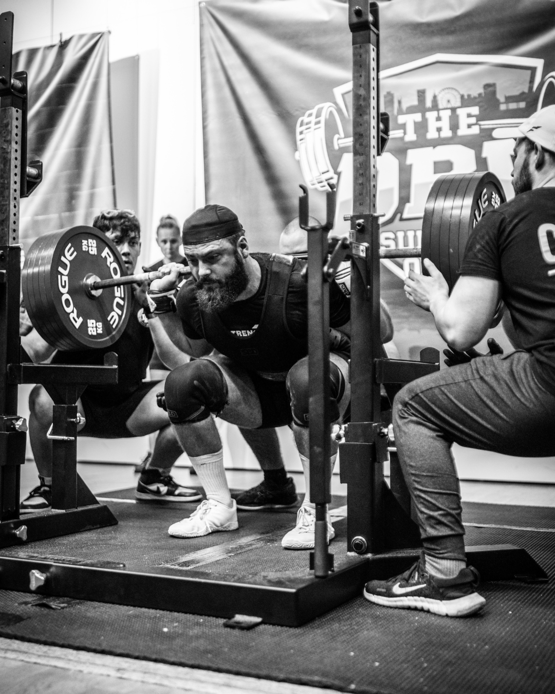 Powerlifting competing at a powerlifting competition