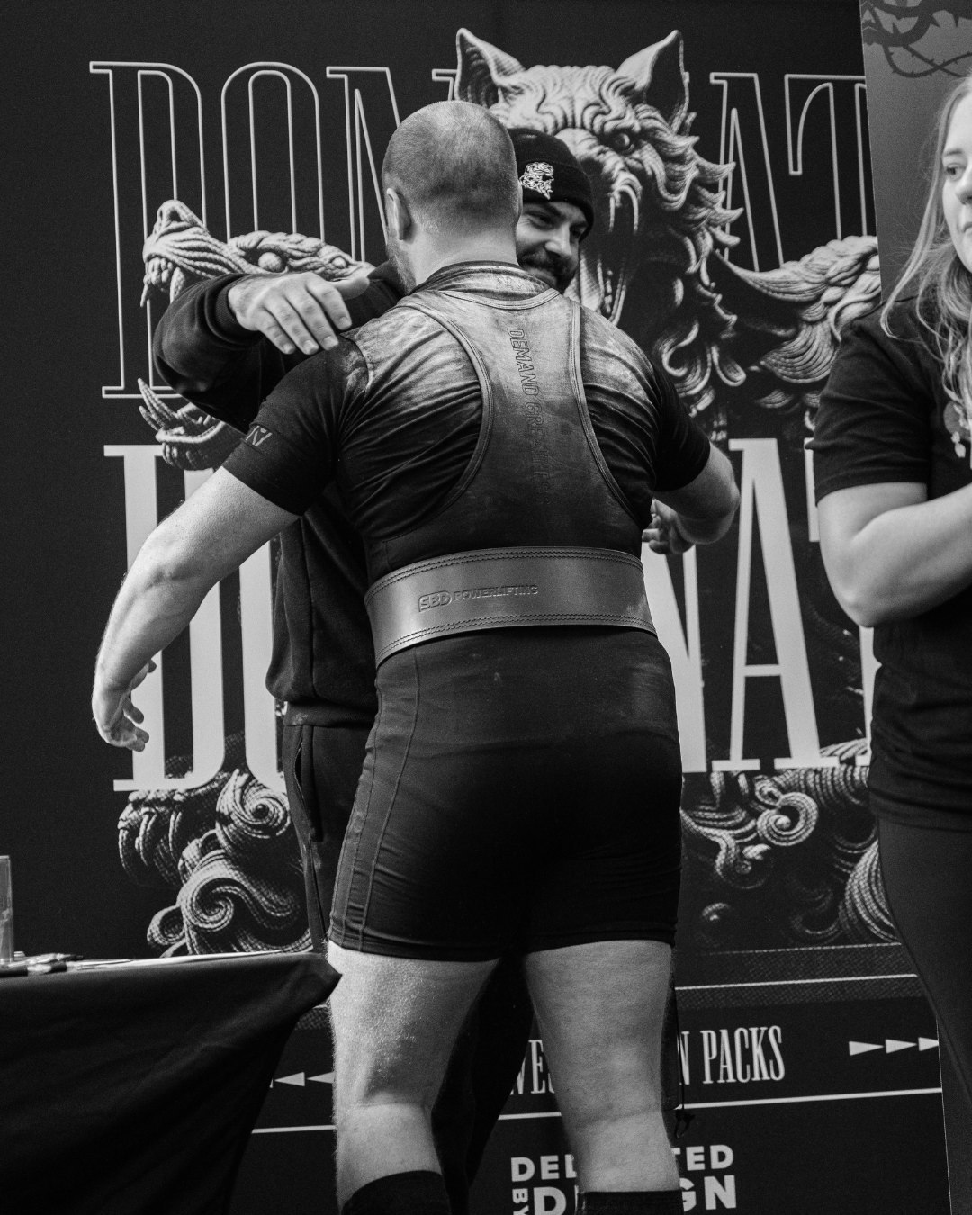 Powerlifting competing at a powerlifting competition