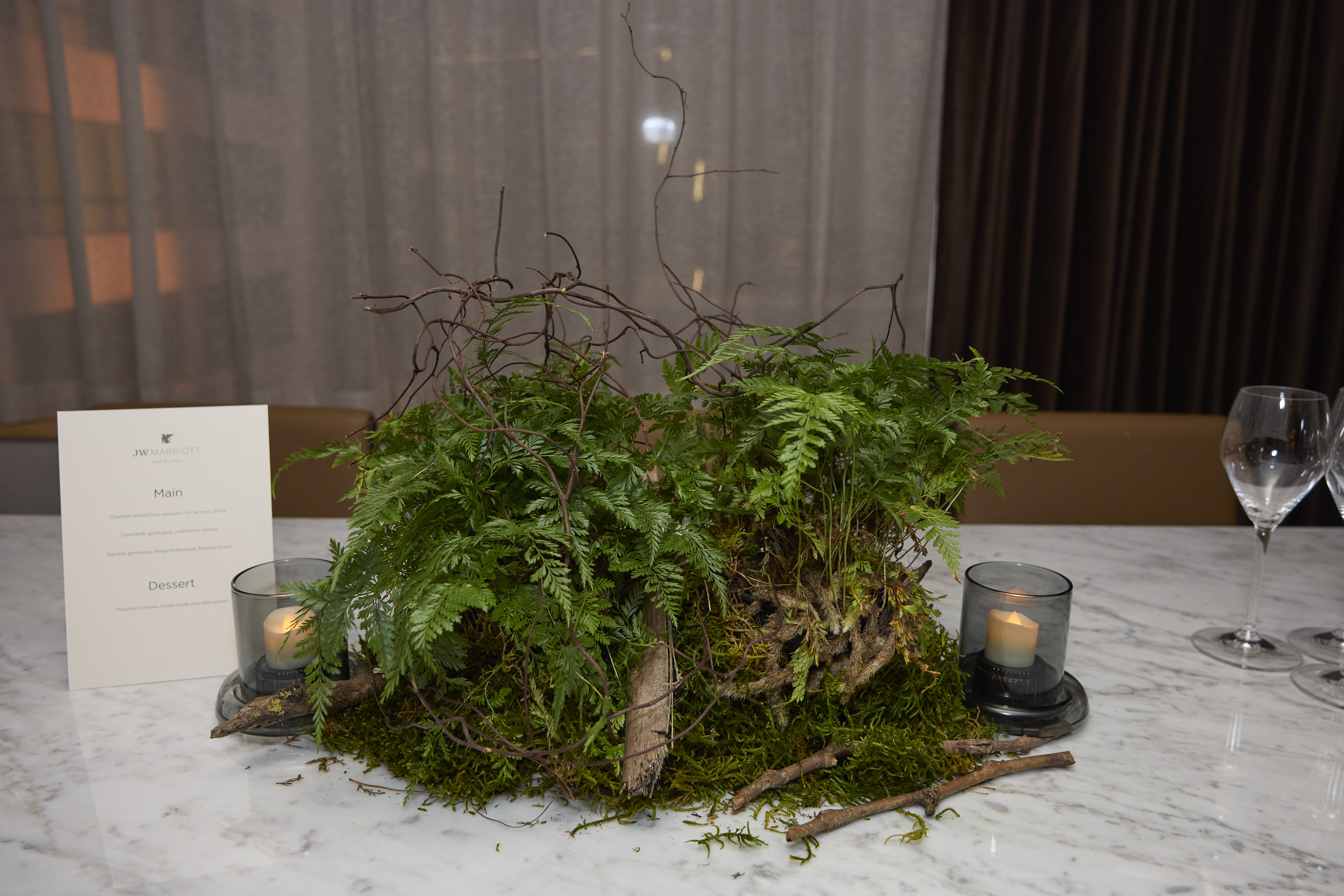 Moss and fern arrangement by GreenAir at the JW Marriott opening