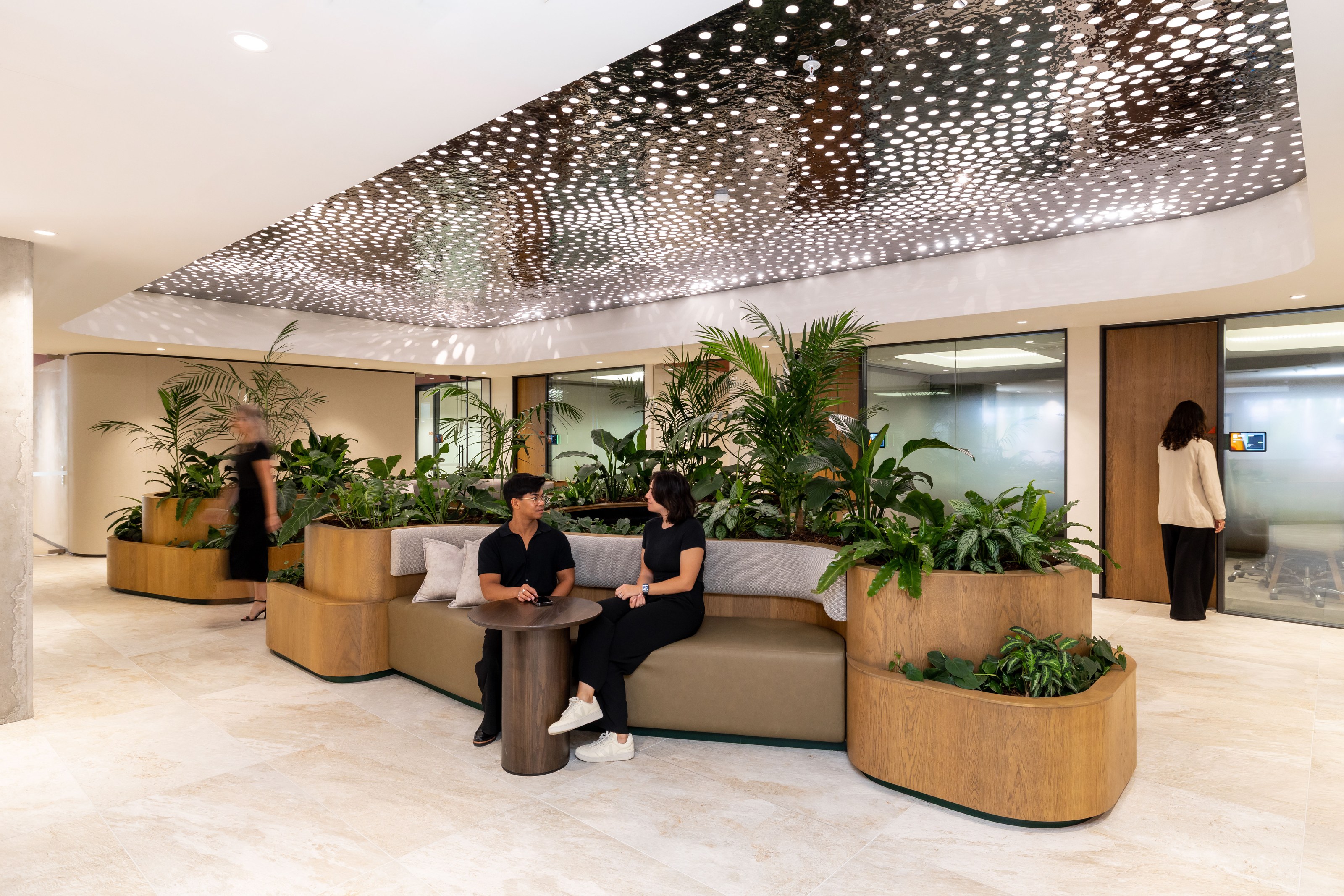 Commercial lounge fit-out with interior planting at the Milford asset