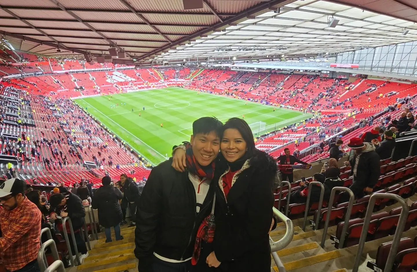 Bingyang and his wife on game day at Old Trafford, 2024