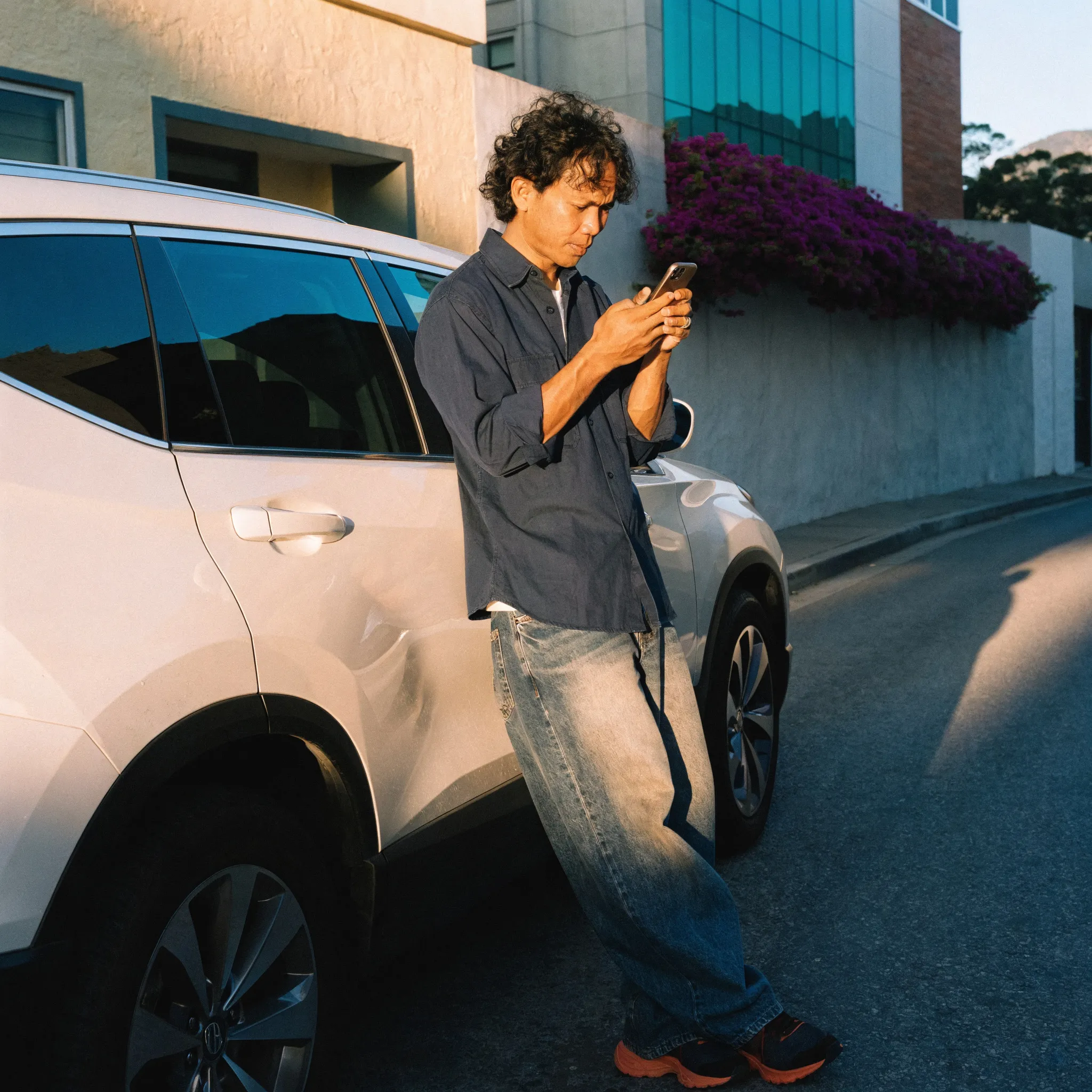 Alt: "Drive Aloha customer completing vehicle subscription booking online in Honolulu"