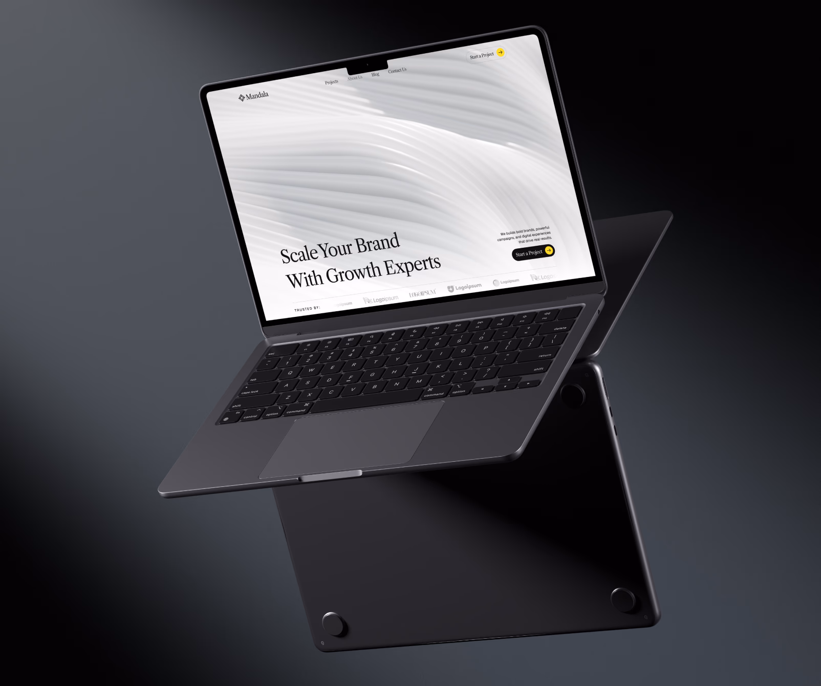 Floating dark laptop with a screen displaying a website titled 'Scale Your Brand With Growth Experts'.