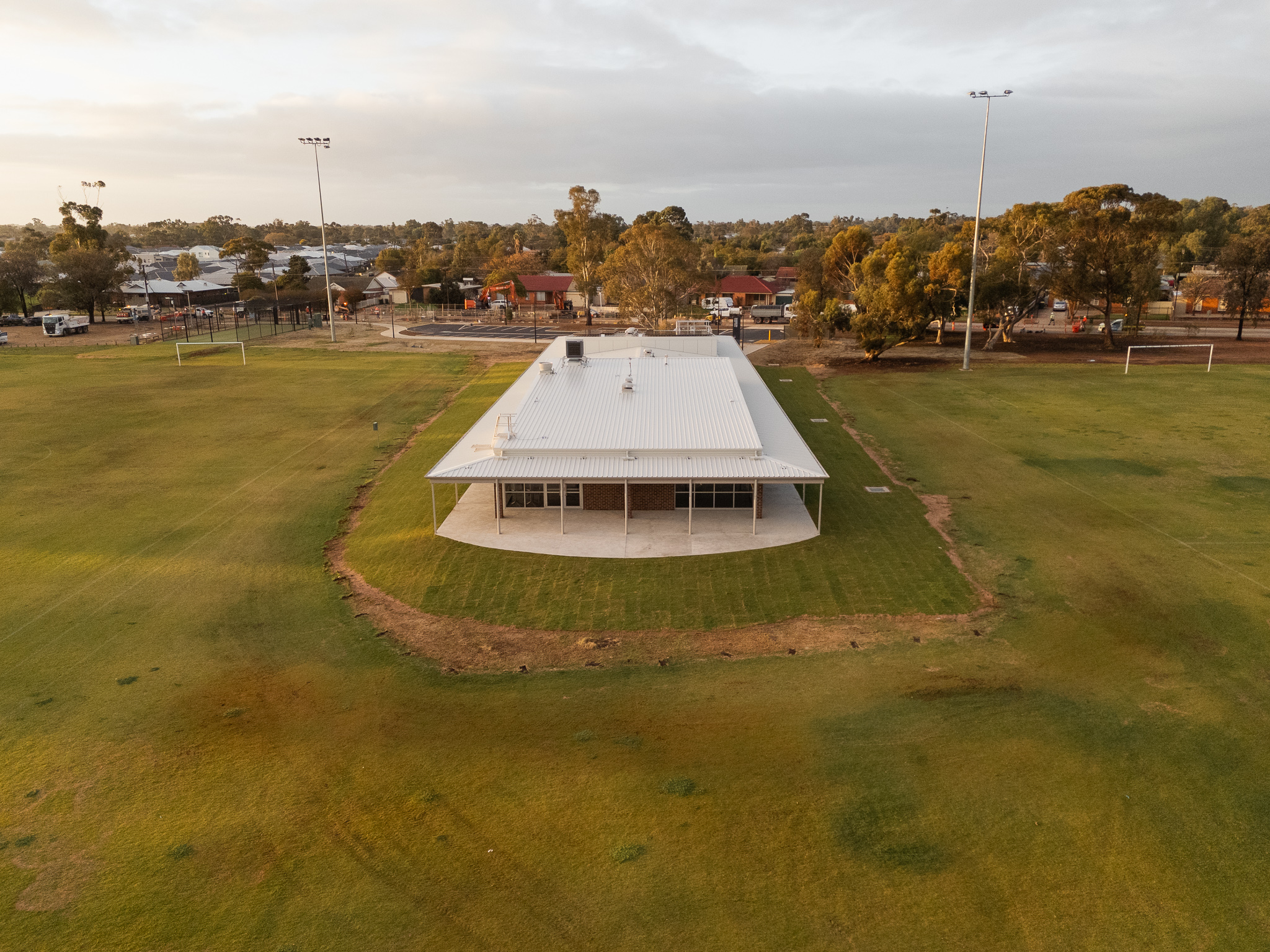 Aerial view of Kalara Reserve Clubrooms, Davoren Park, showing the concealed-fix metal roof and wraparound verandah