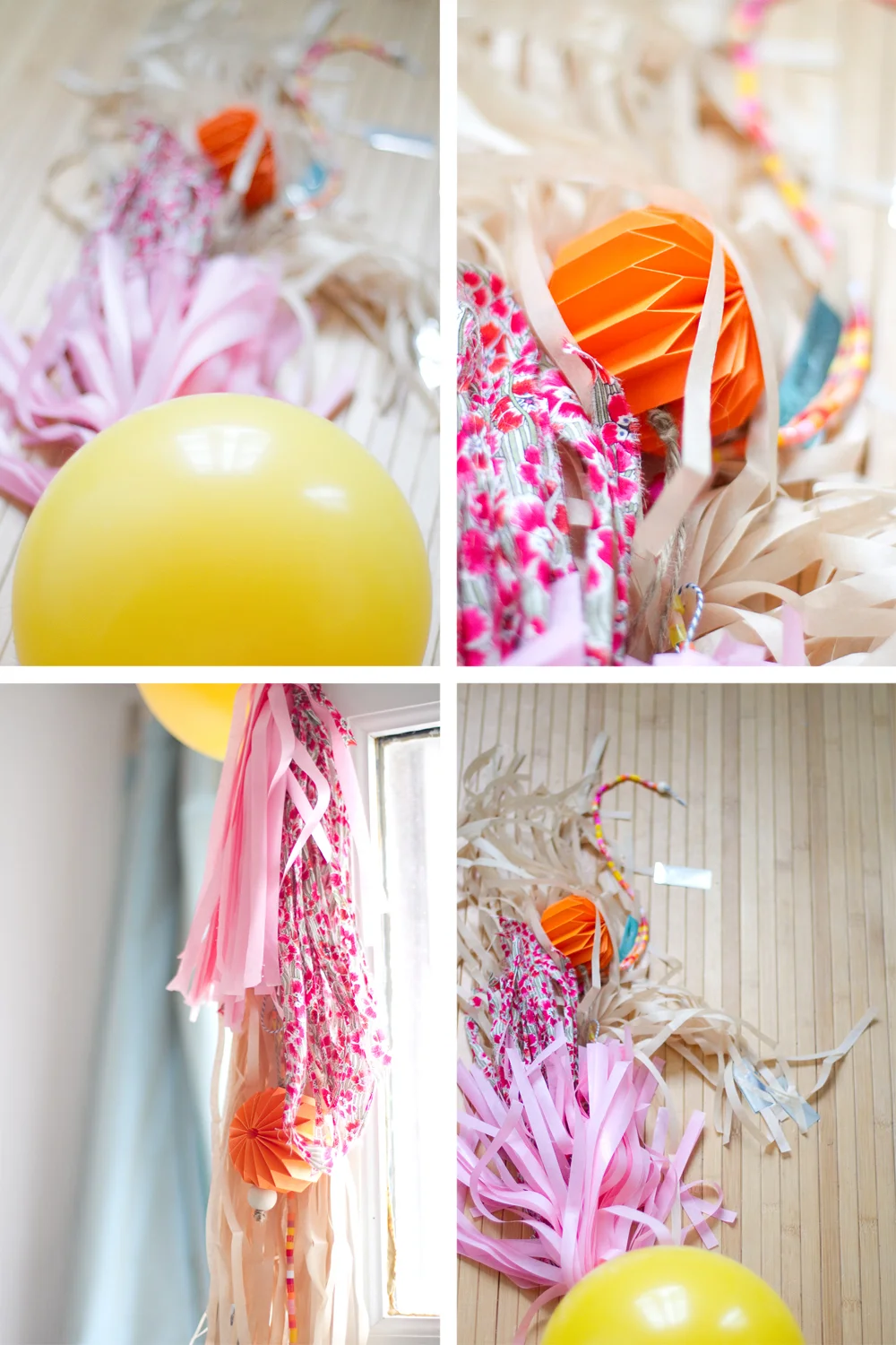 Décorations festives DIY composées de glands et pompons roses, jaunes et orange sur un fond neutre.
