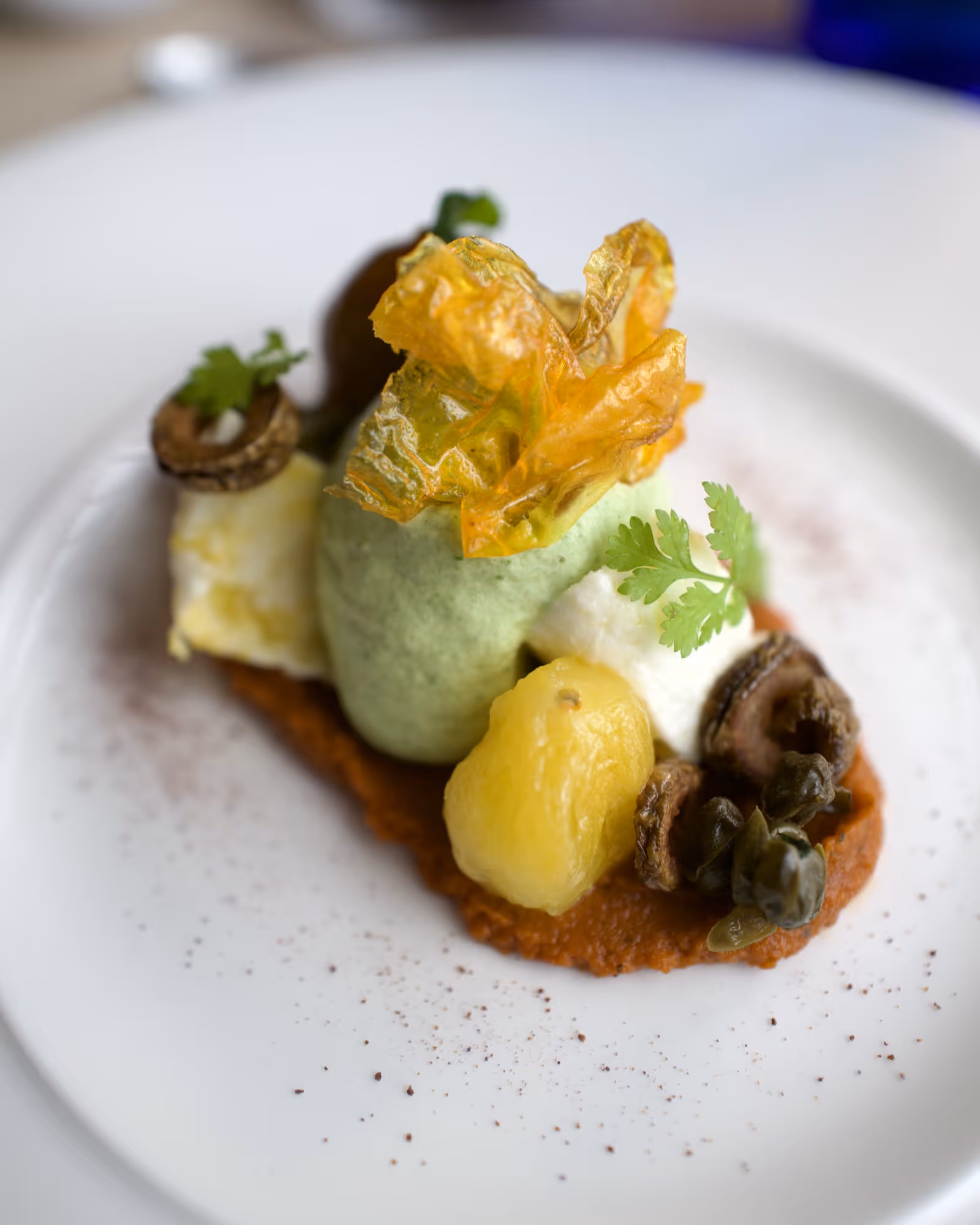 Kreatives Gourmetgericht auf dem Teller im Tannerhof Bayrischzell