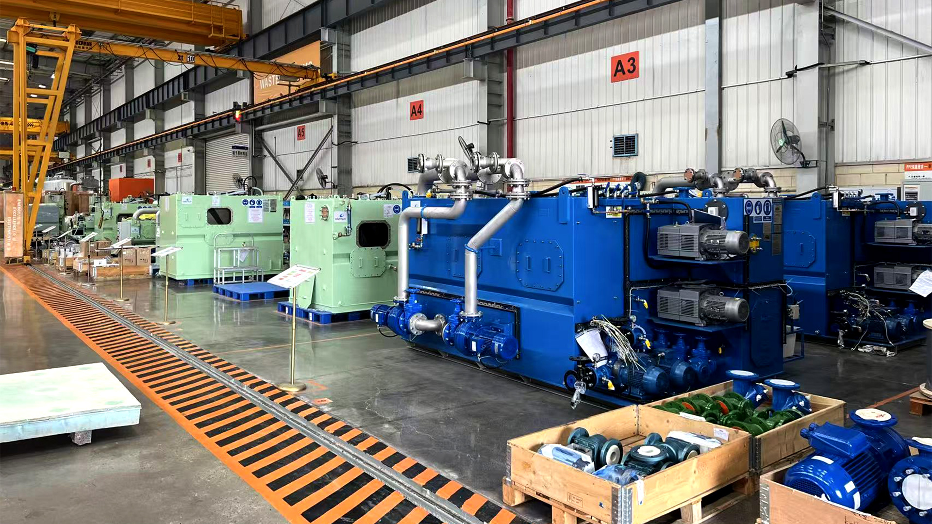 Industrial wastewater treatment equipment and machinery installed inside a manufacturing facility.