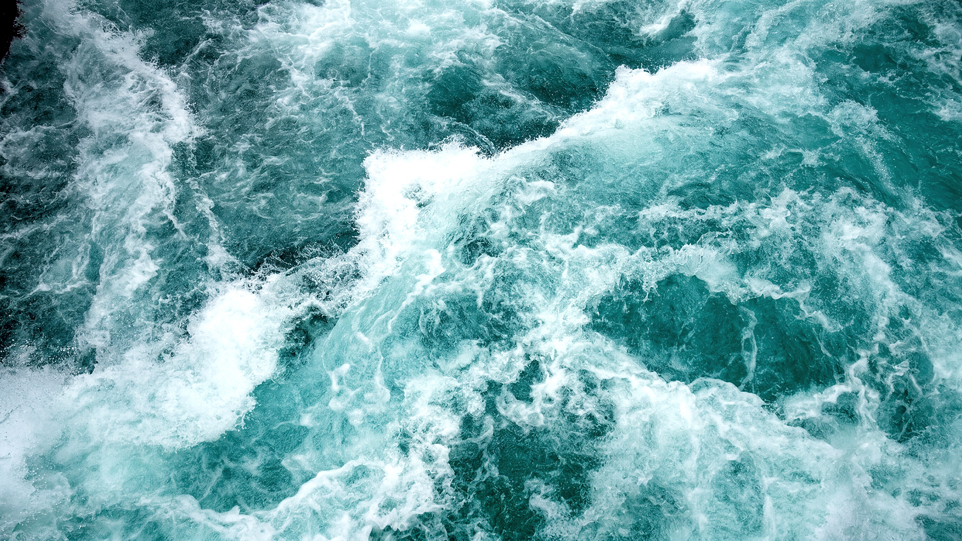 Dynamic ocean water texture representing marine freshwater generation and desalination solutions.